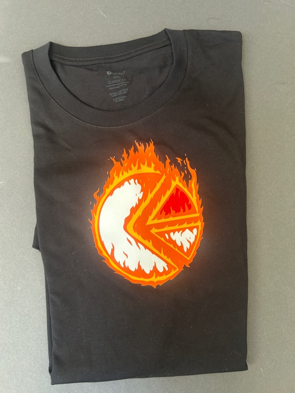 ethika Black Tee with Fiery Orange and White Flame Logo